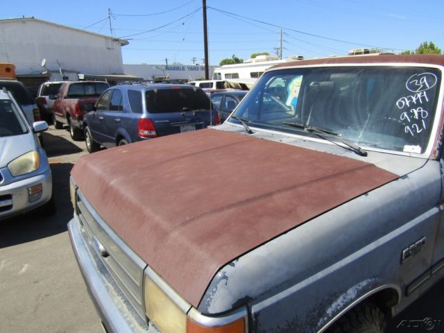 1990 Blue Ford F-250 Pickup Truck