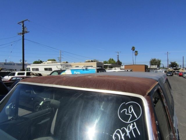 1990 Blue Ford F-250 Pickup Truck