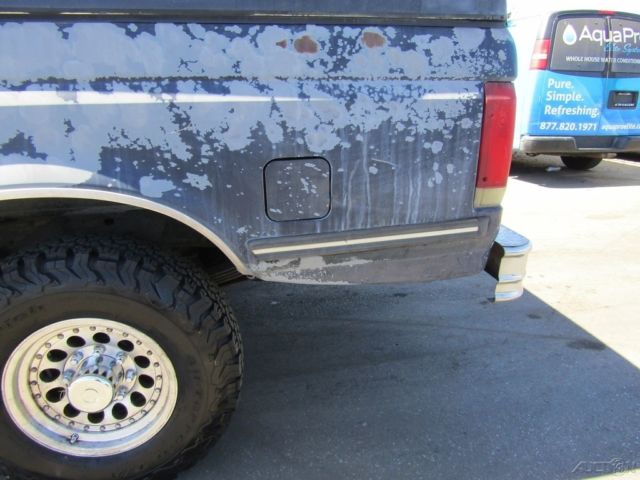 1990 Blue Ford F-250 Pickup Truck