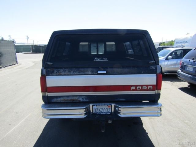 1990 Blue Ford F-250 Pickup Truck