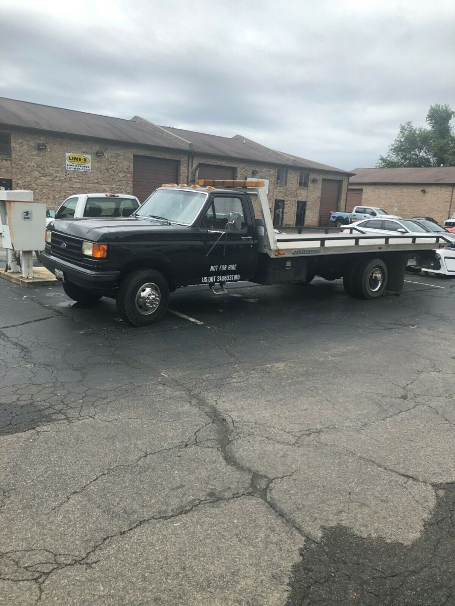 1990 Black Ford F-350 Roll Back