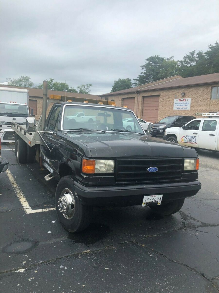1990 Black Ford F-350 Roll Back