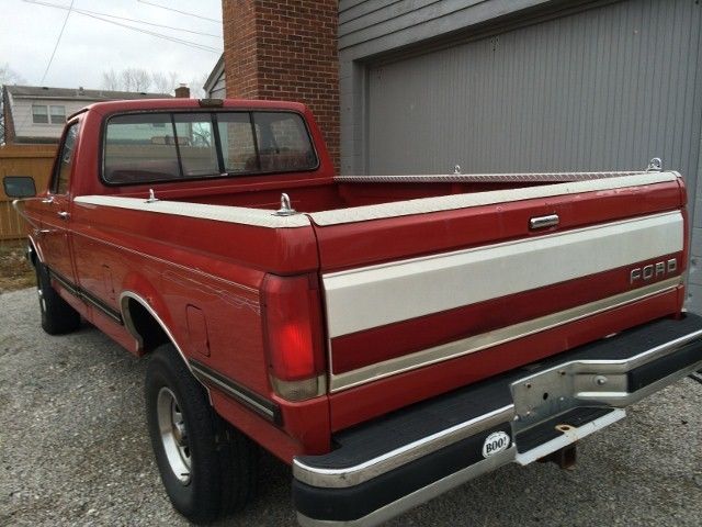 1990 Red Ford F-150 Standard Cab Pickup