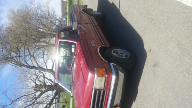 1990 Red Ford F-150 Standard Cab Pickup
