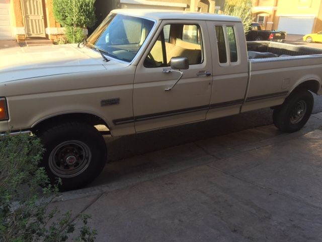 1990 Burgundy Ford F-250 Standard Cab Pickup