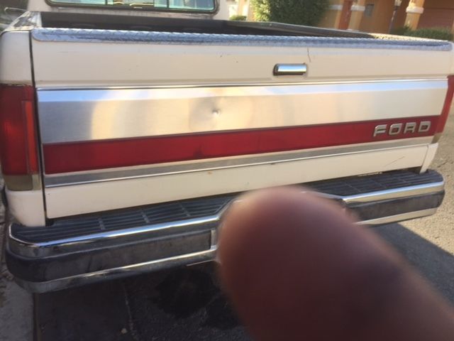 1990 Burgundy Ford F-250 Standard Cab Pickup