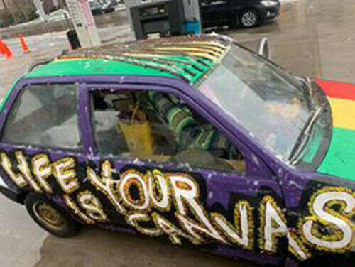 1990 Red Ford Festiva Hatchback