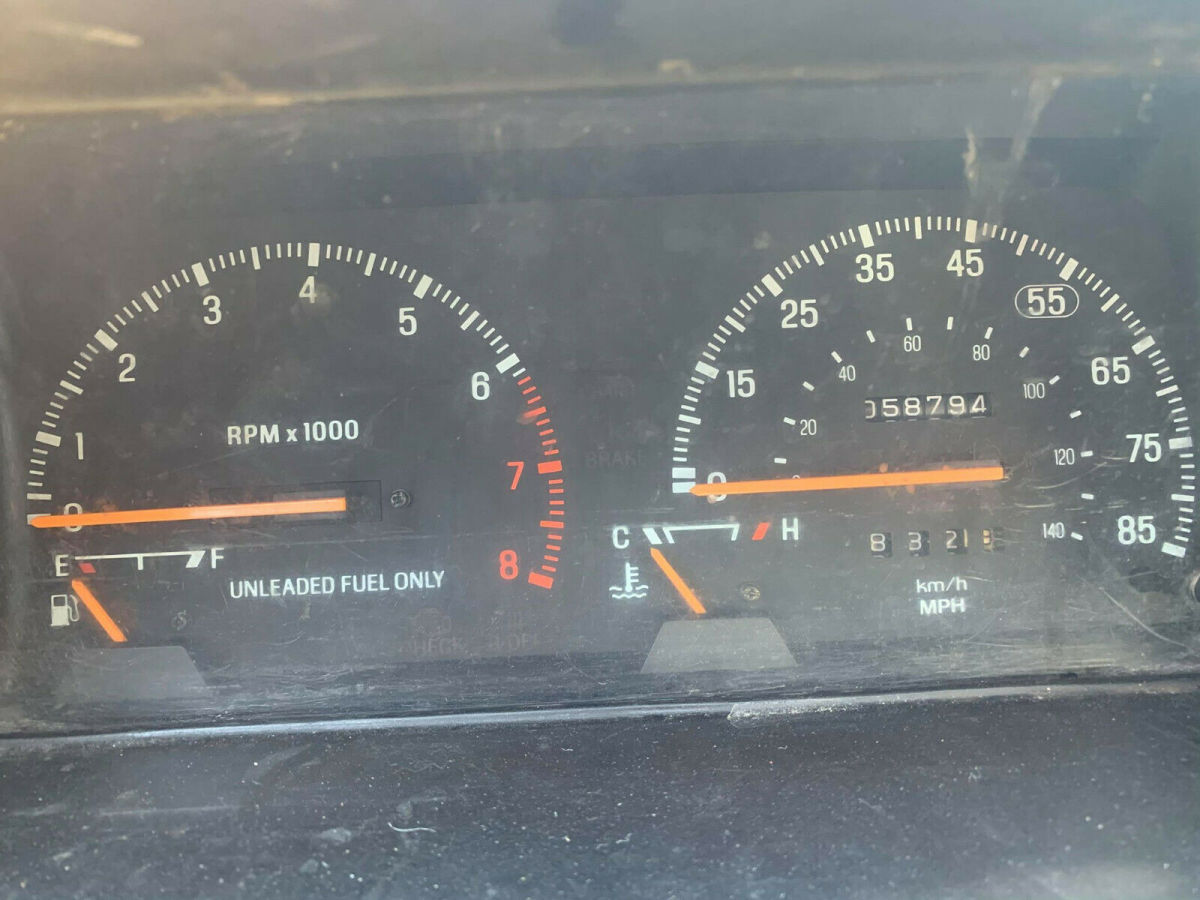 1990 Red Ford Festiva Hatchback