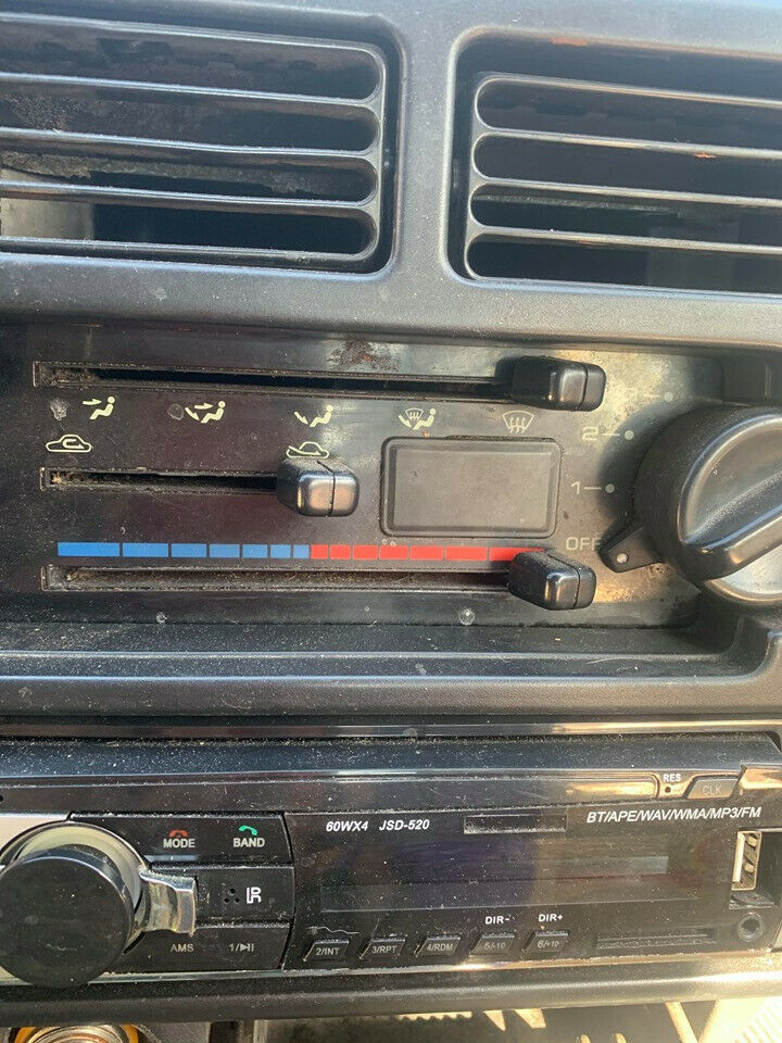 1990 Red Ford Festiva Hatchback