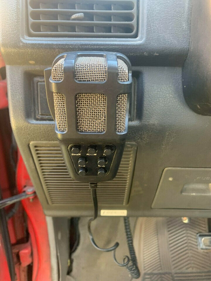 1990 Red Ford Festiva Hatchback