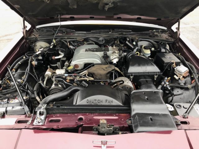 1990 Burgundy Ford LTD COUNTRY SQUIRE LX Wagon