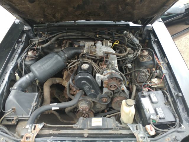 1990 Black Ford Mustang Hatchback