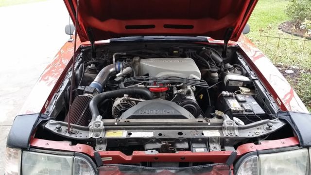 1990 Orange Ford Mustang fox