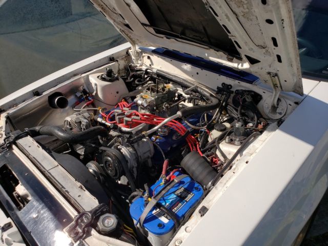 1990 White Ford Mustang Hatchback