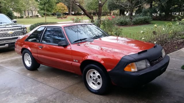 1990 Orange Ford Mustang fox