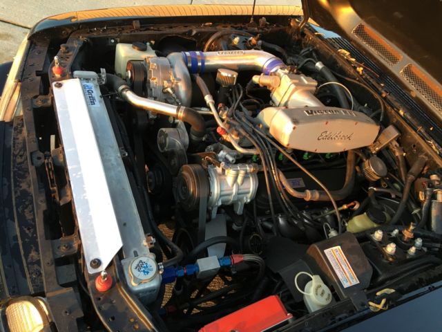 1990 Black Ford Mustang Hatchback