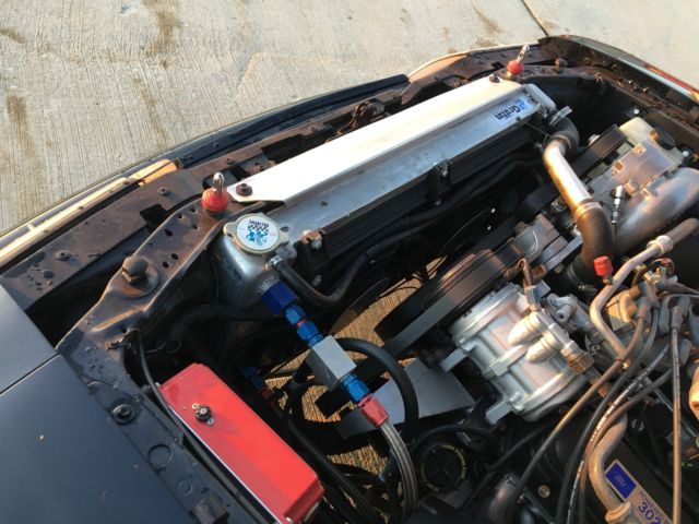 1990 Black Ford Mustang Hatchback