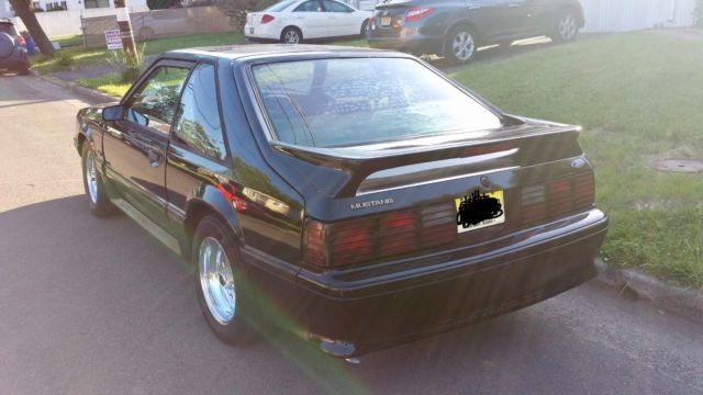 1990 Black Ford Mustang Hatchback