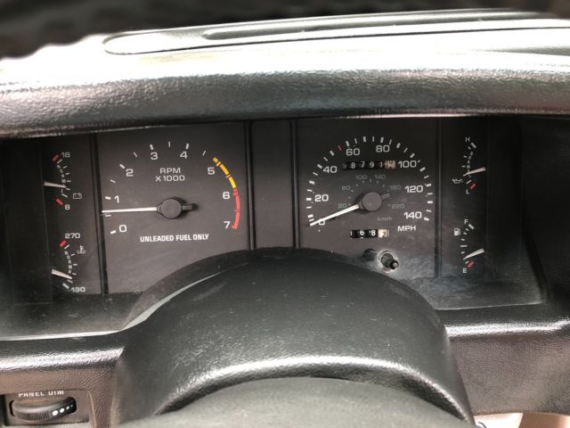 1990 White Ford Mustang Hatchback