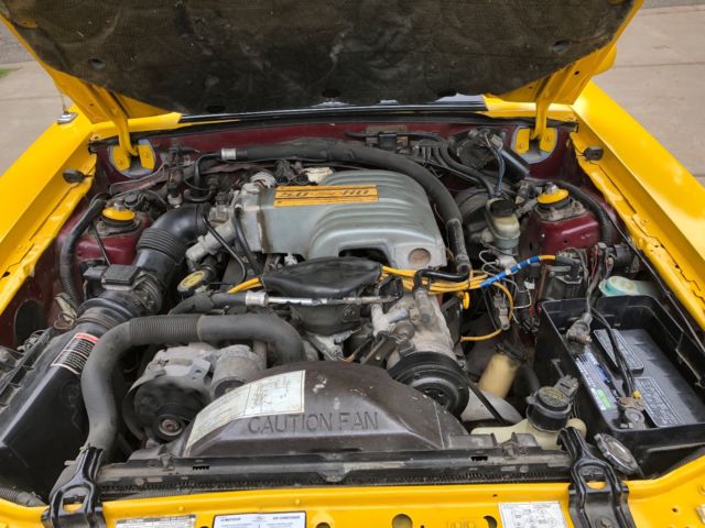 1990 White Ford Mustang Hatchback