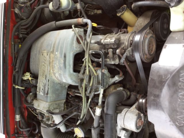 1990 Red Ford Mustang Convertible