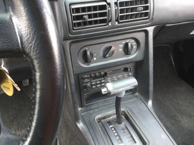 1990 Red Ford Mustang Convertible