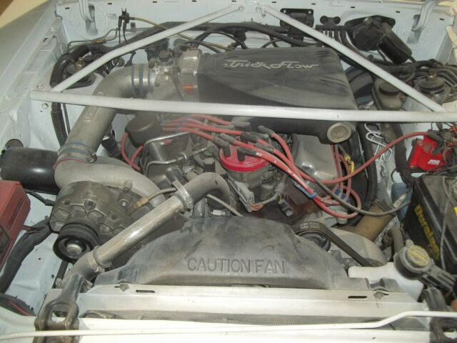 1990 White Ford Mustang Hatchback