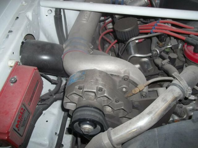 1990 White Ford Mustang Hatchback