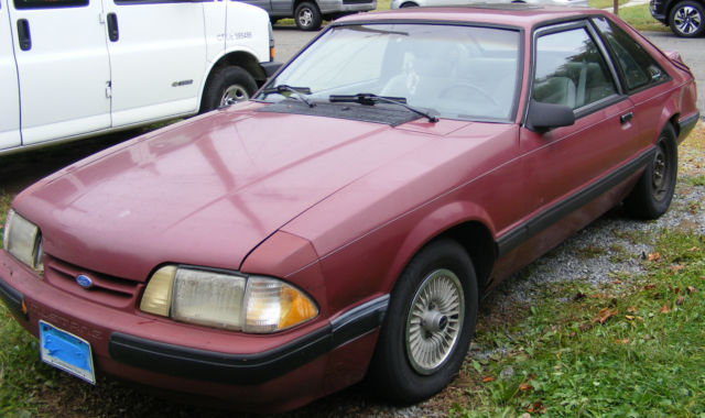 1990 Burgundy Ford Mustang Hatchback