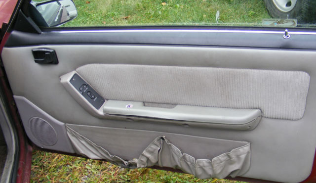 1990 Burgundy Ford Mustang Hatchback