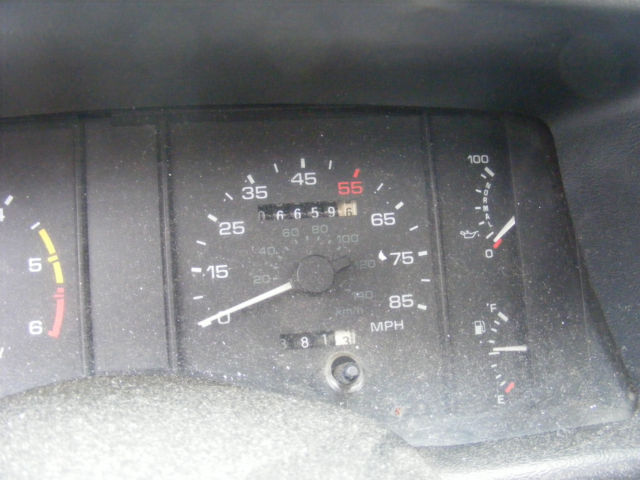 1990 Burgundy Ford Mustang Hatchback