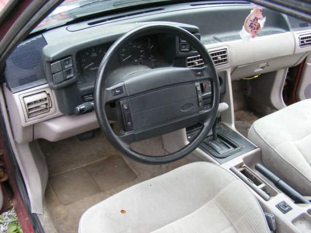 1990 Burgundy Ford Mustang Hatchback