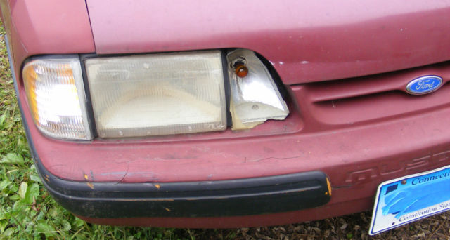 1990 Burgundy Ford Mustang Hatchback