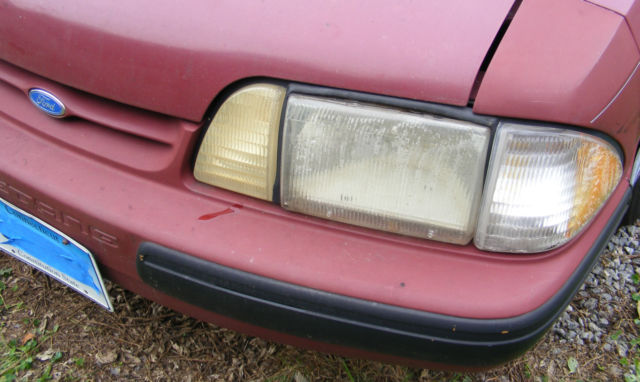 1990 Burgundy Ford Mustang Hatchback