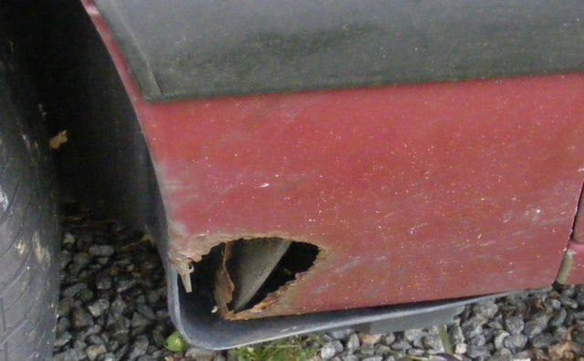 1990 Burgundy Ford Mustang Hatchback