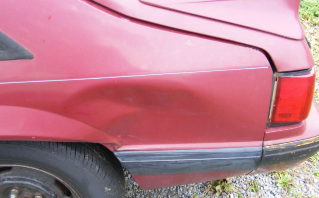 1990 Burgundy Ford Mustang Hatchback