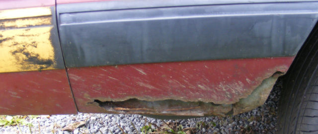 1990 Burgundy Ford Mustang Hatchback