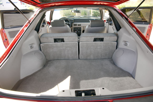 1990 Strawberry Ford Mustang 2 Door Hatchback