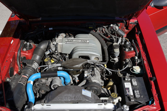 1990 Strawberry Ford Mustang 2 Door Hatchback