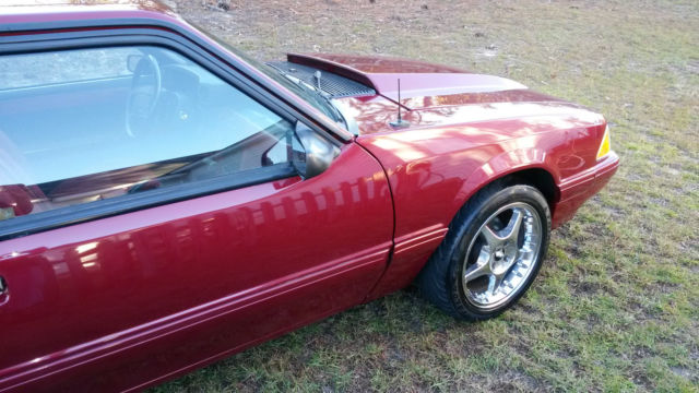 1990 Strawberry Ford Mustang 2 Door Hatchback