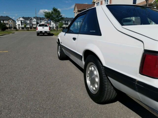 1990 White Ford Mustang Hatchback