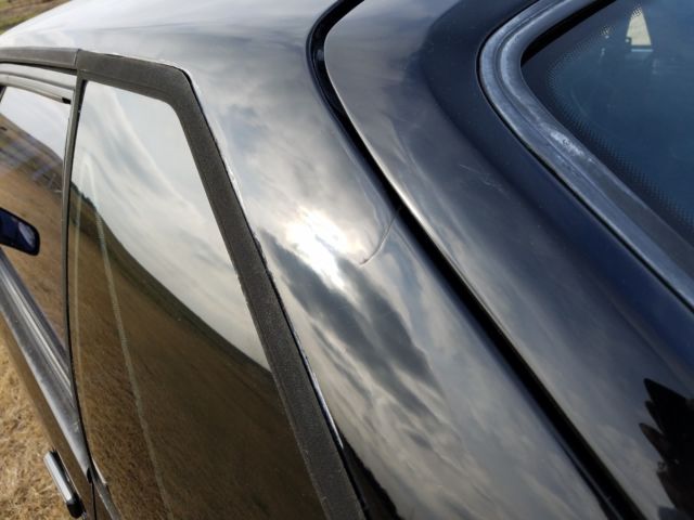 1990 Black Ford Mustang Hatchback