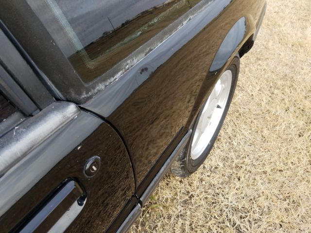 1990 Black Ford Mustang Hatchback