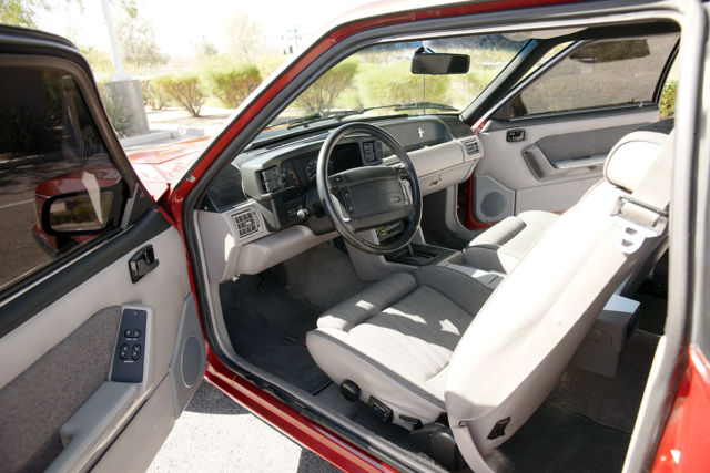 1990 Strawberry Ford Mustang 2 Door Hatchback
