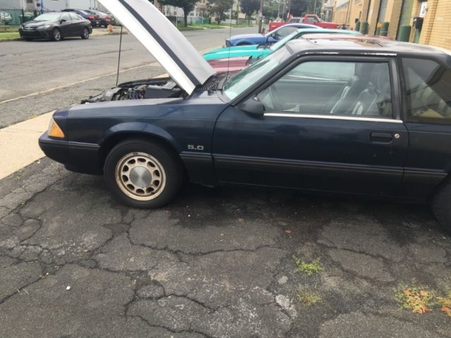 1990 Blue Ford Mustang