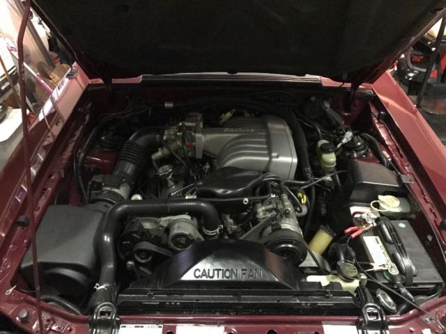 1990 Burgundy Ford Mustang Convertible