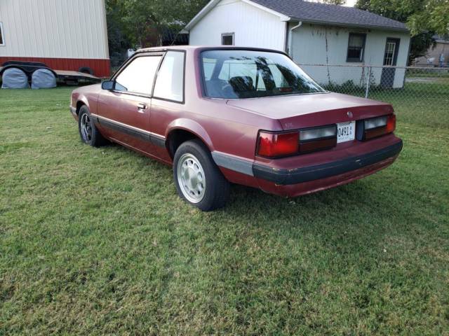1990 Burgundy Ford Mustang Coupe