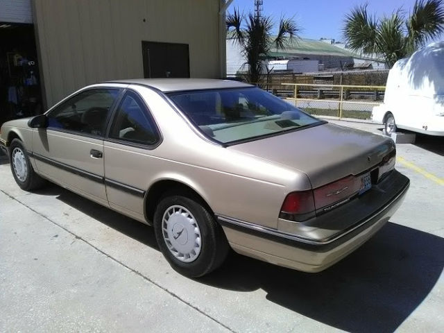 1990 Gold Ford Thunderbird Coupe