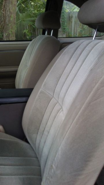 1990 Gold Ford Thunderbird Coupe