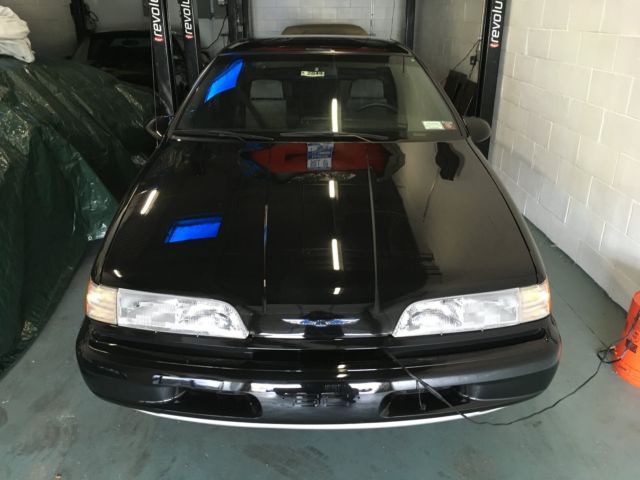 1990 Black Ford Thunderbird Coupe